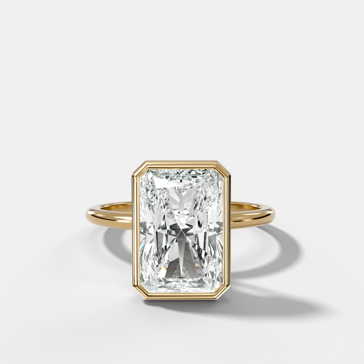 Penumbra Bezel Hidden Halo Engagement Ring with Elongated Radiant Cut