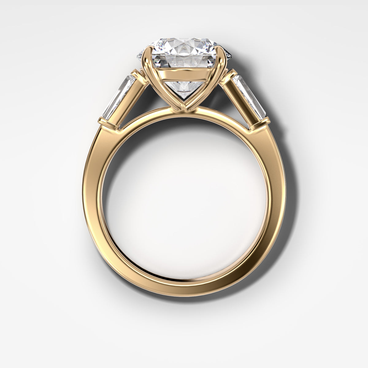 Anillo de compromiso translunar de talla baguette cónica y talla redonda