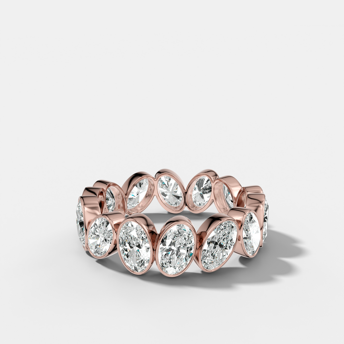 Tilted Bezel Set Eternity Band with Oval Cuts