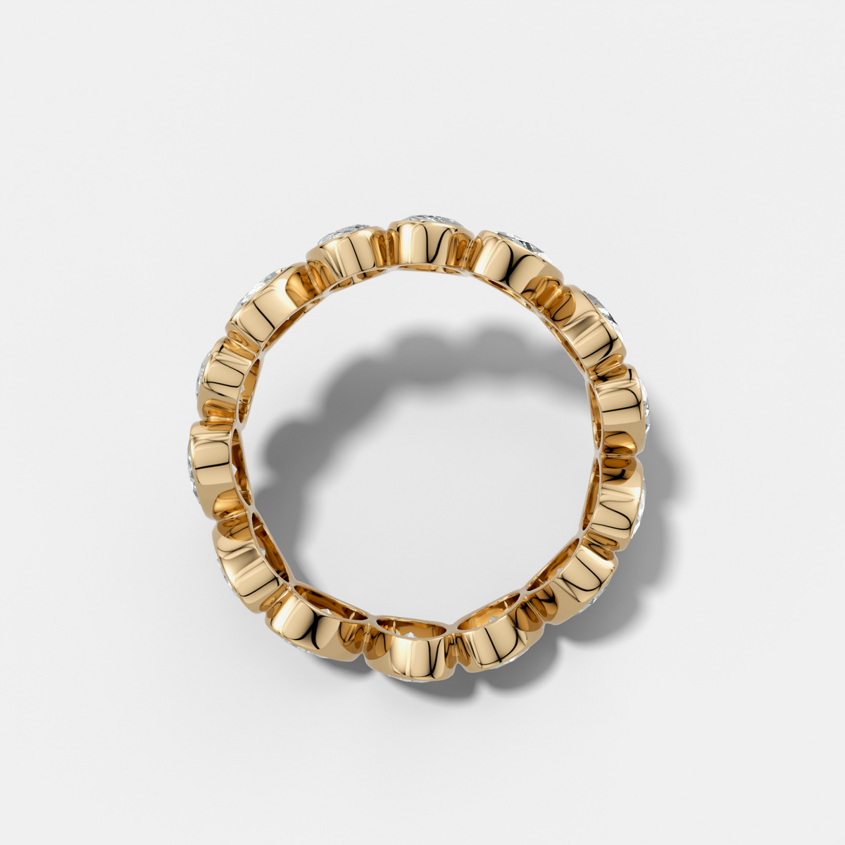 Tilted Bezel Set Eternity Band with Oval Cuts