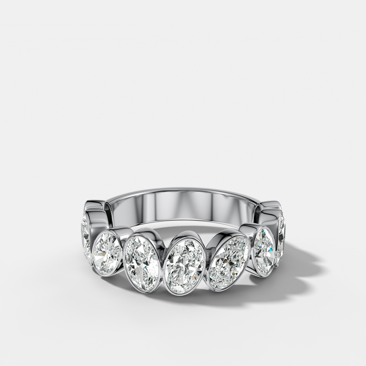 Tilted Bezel Set Wedding Band with Oval Cuts