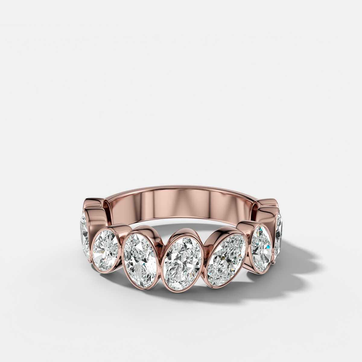 Tilted Bezel Set Wedding Band with Oval Cuts