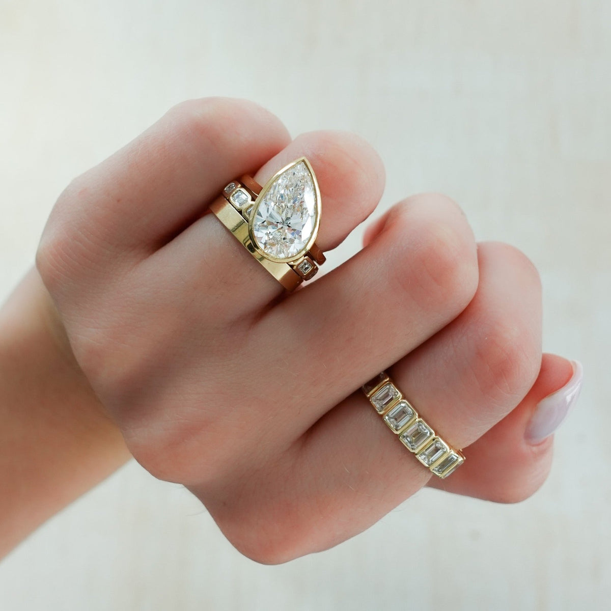 Baby Bezel Set Eternity Band With East West Emerald Cuts - GOODSTONE