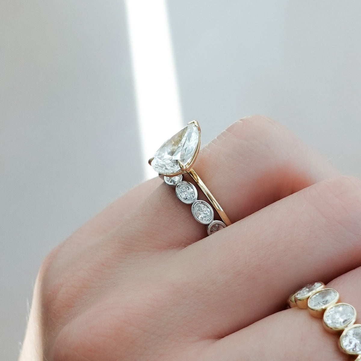 Baby Bezel Set Eternity Band With East West Oval Cuts - GOODSTONE