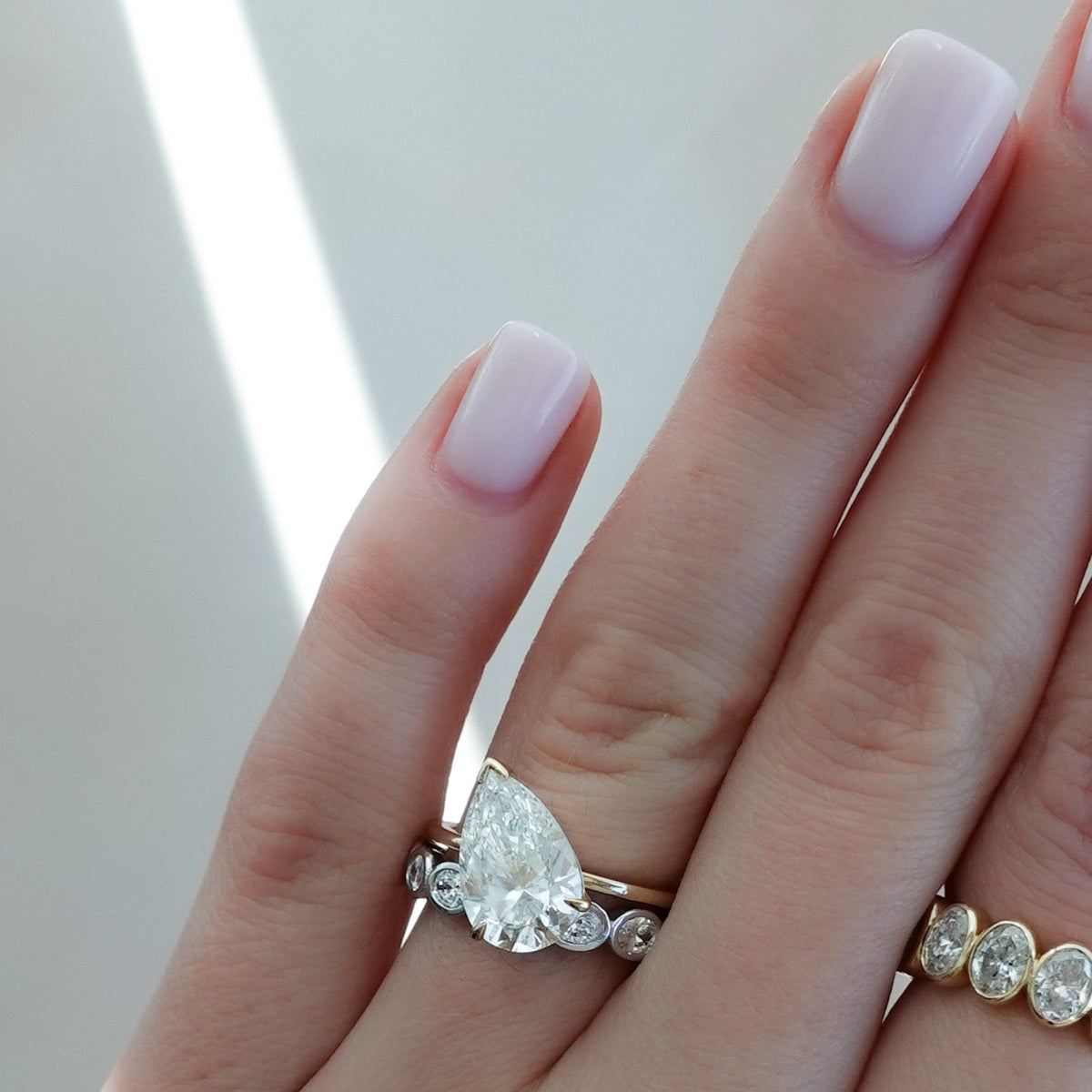 Baby Bezel Set Eternity Band With East West Oval Cuts - GOODSTONE