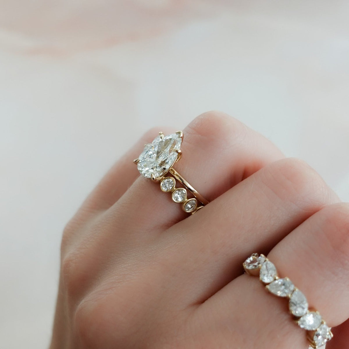 Baby Bezel Set Eternity Band With Oval Cuts - GOODSTONE