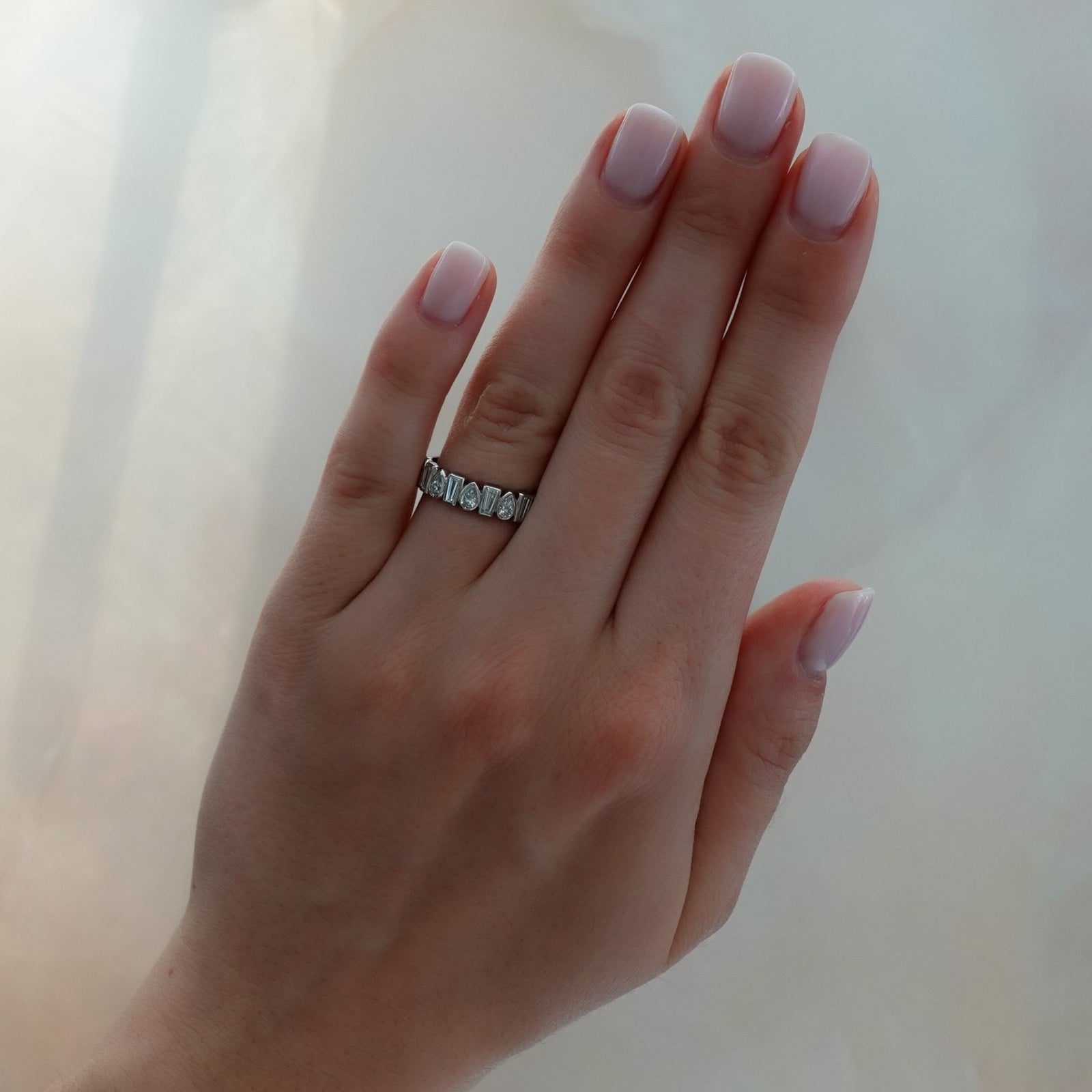 Baby Bezel Set Eternity Band with Pear and Tapered Baguette Diamonds - GOODSTONE