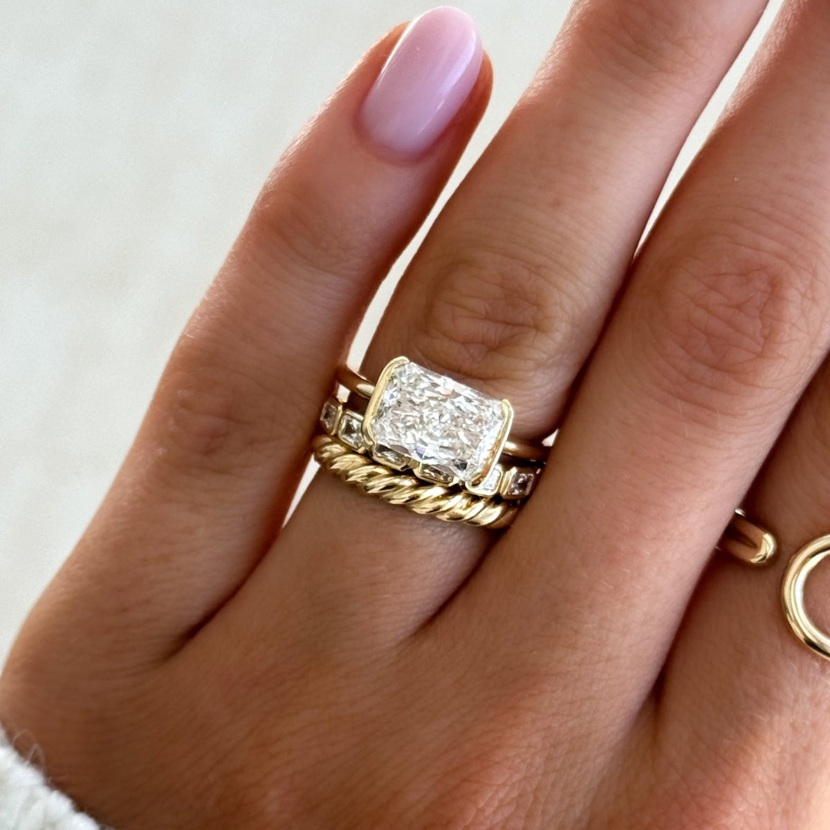 Baby Bezel Set Halfway Wedding Band With East West Radiant Cuts - GOODSTONE