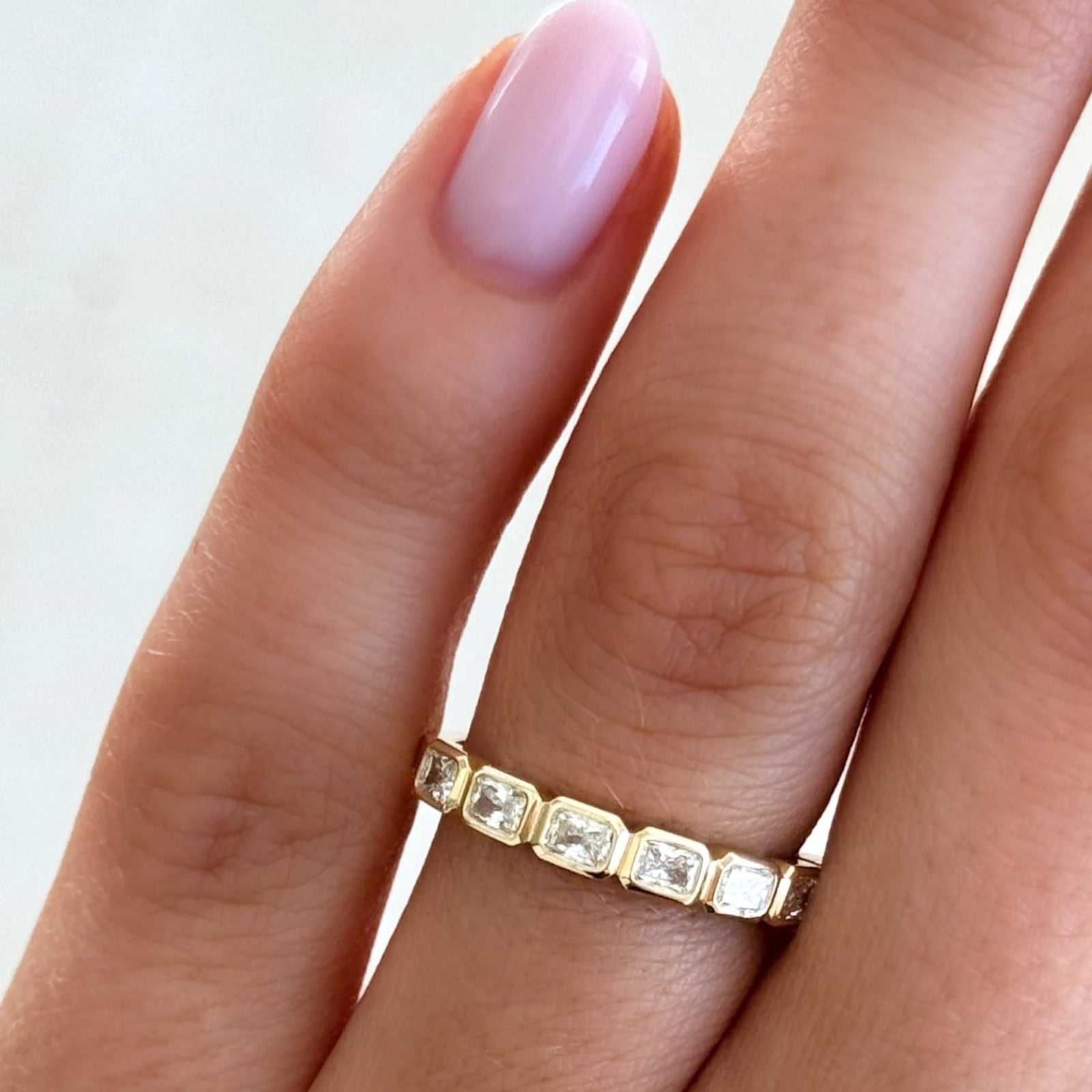 Baby Bezel Set Halfway Wedding Band With East West Radiant Cuts - GOODSTONE