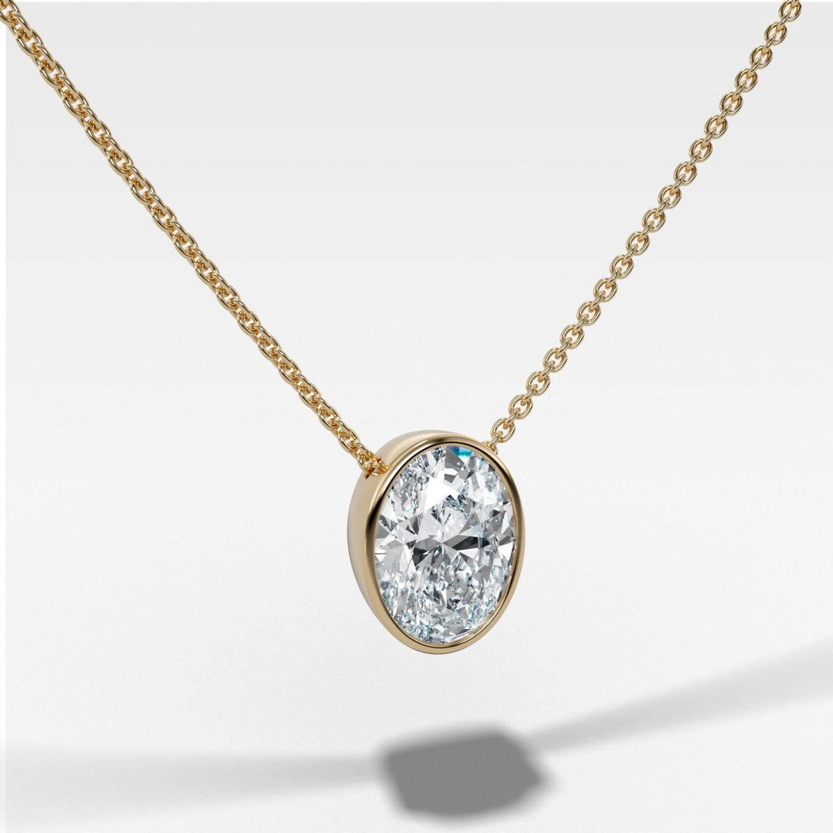 Bezel Pendant Necklace with an Oval Cut Diamond - GOODSTONE