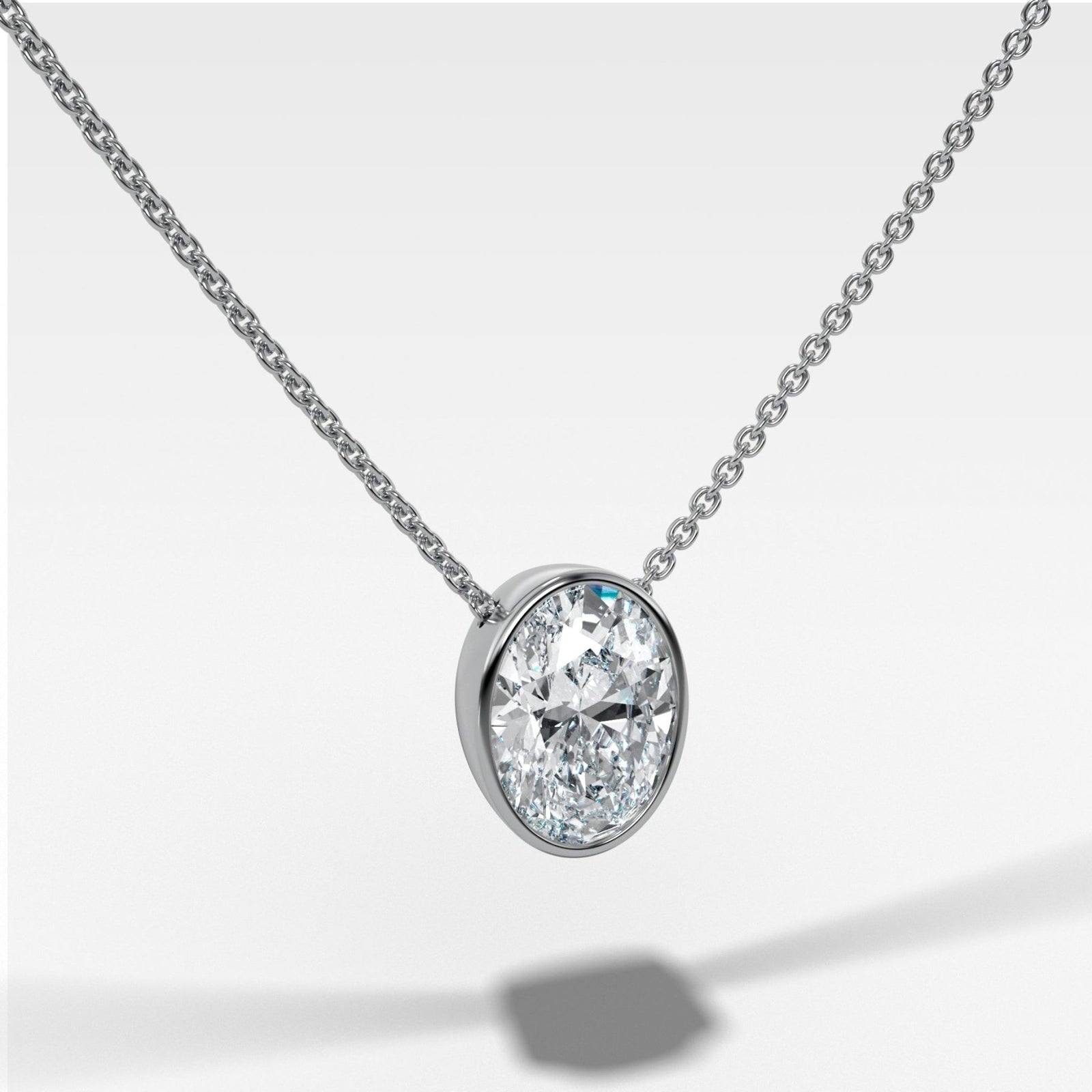 Bezel Pendant Necklace with an Oval Cut Diamond - GOODSTONE