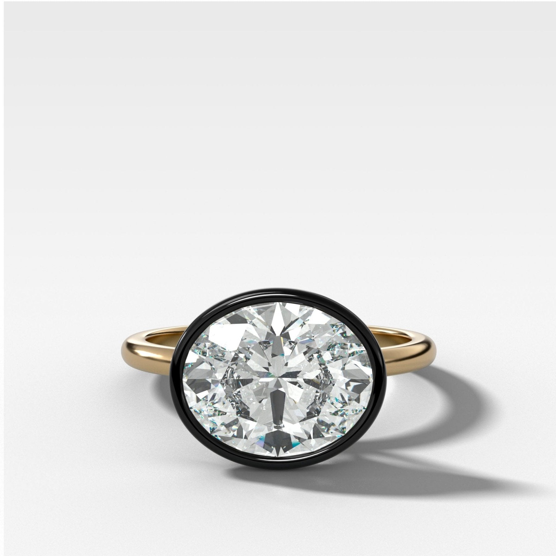 Blackened Penumbra Bezel Set Engagement Ring With East West Oval Cut - GOODSTONE