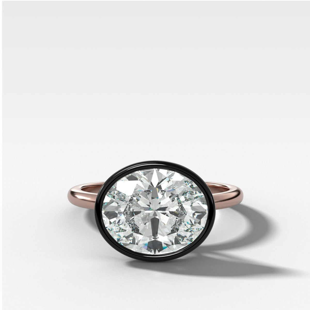 Blackened Penumbra Bezel Set Engagement Ring With East West Oval Cut - GOODSTONE