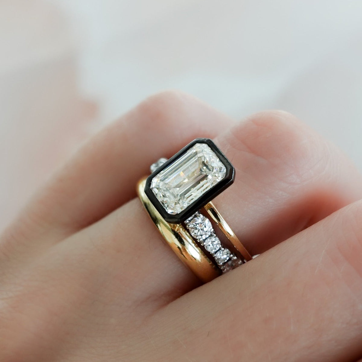 Blackened Penumbra Bezel Set Engagement Ring With Emerald Cut - GOODSTONE