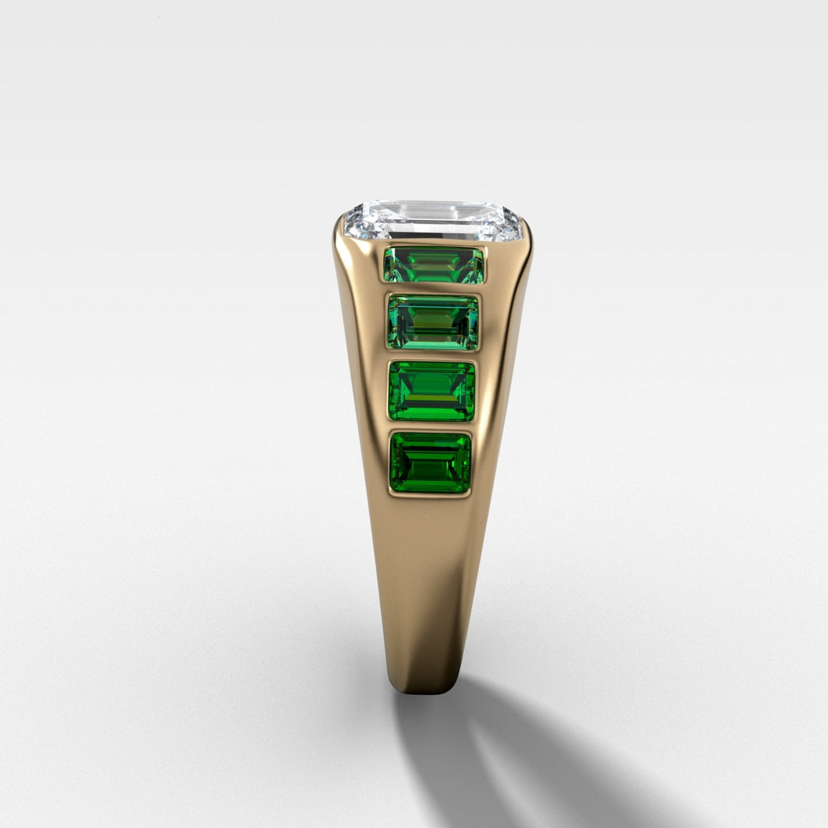 Brick Road Engagement Ring with Green Emeralds and an Emerald Cut - GOODSTONE