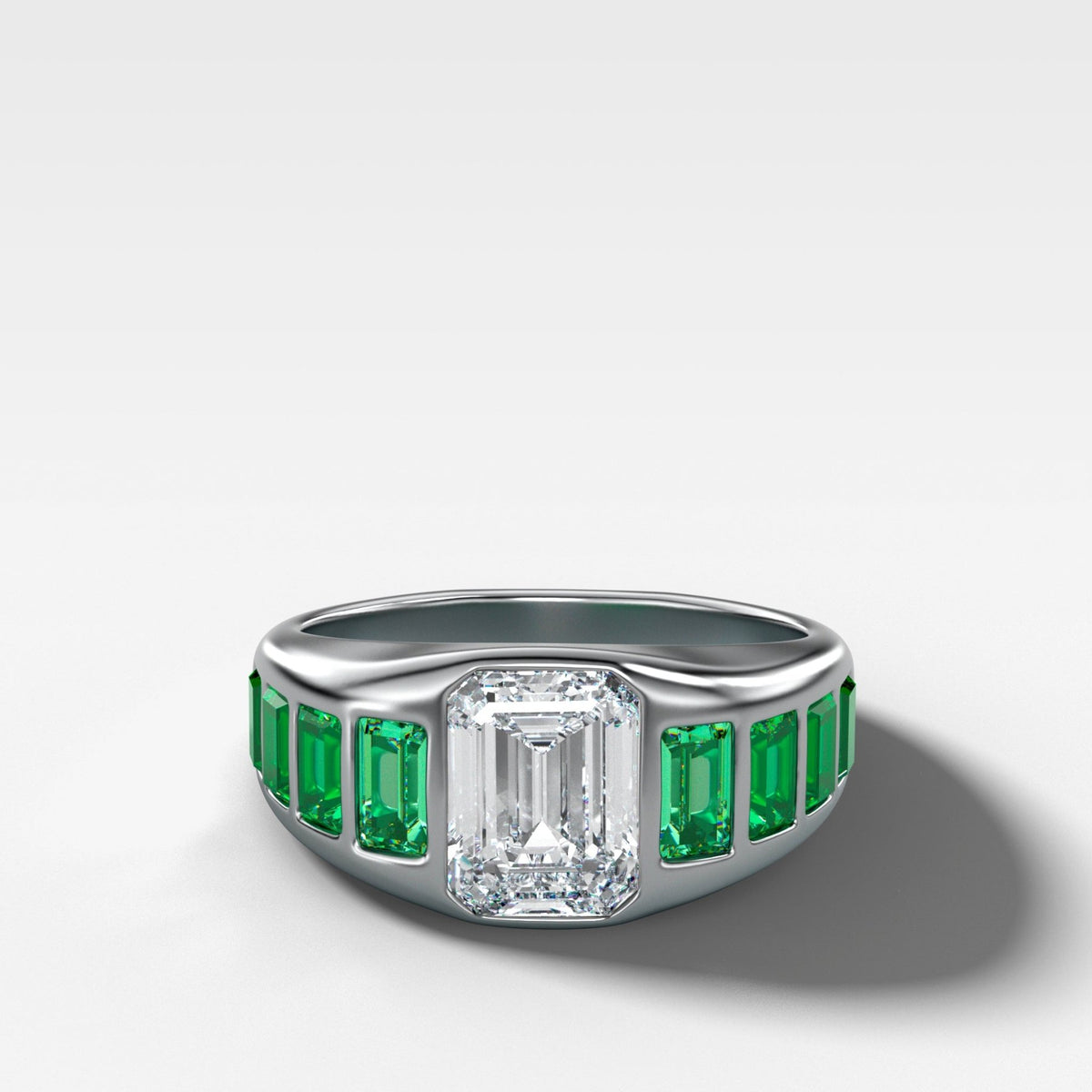 Brick Road Engagement Ring with Green Emeralds and an Emerald Cut - GOODSTONE