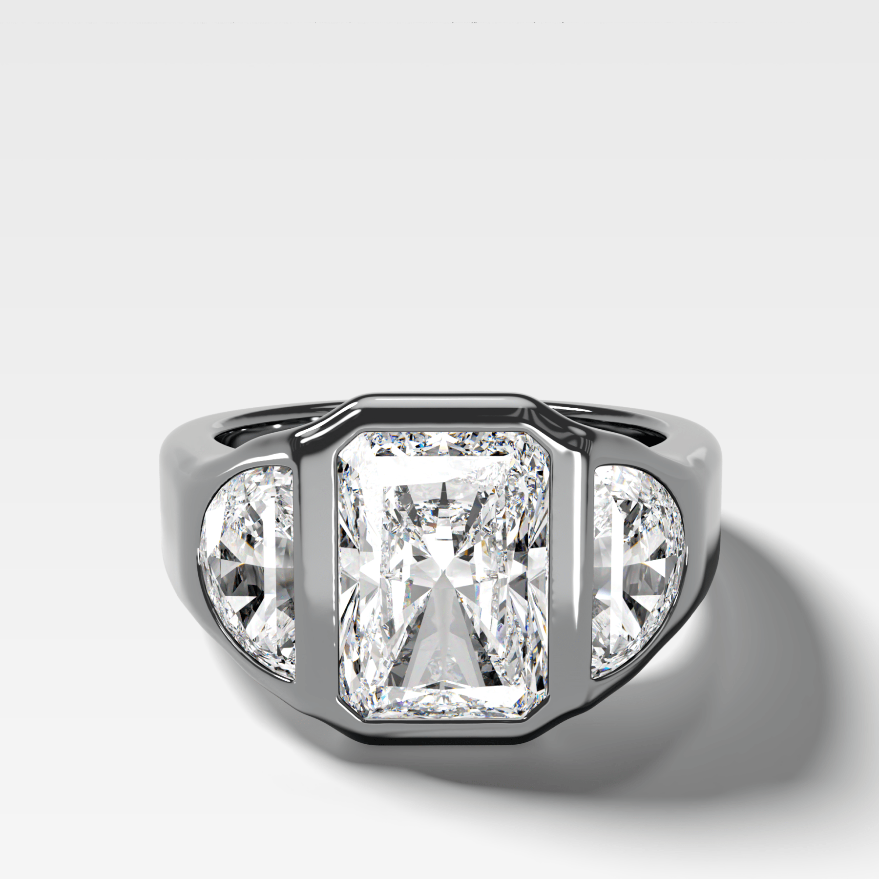 Burnished Three Stone Engagement Ring with Half Moon Sides and an Elongated Radiant Cut Diamond - GOODSTONE