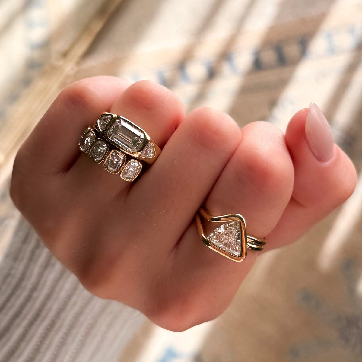 Burnished Three Stone Engagement Ring with Trilliant Sides and East West 2.53ct Lab Grown Emerald Cut Diamond - GOODSTONE
