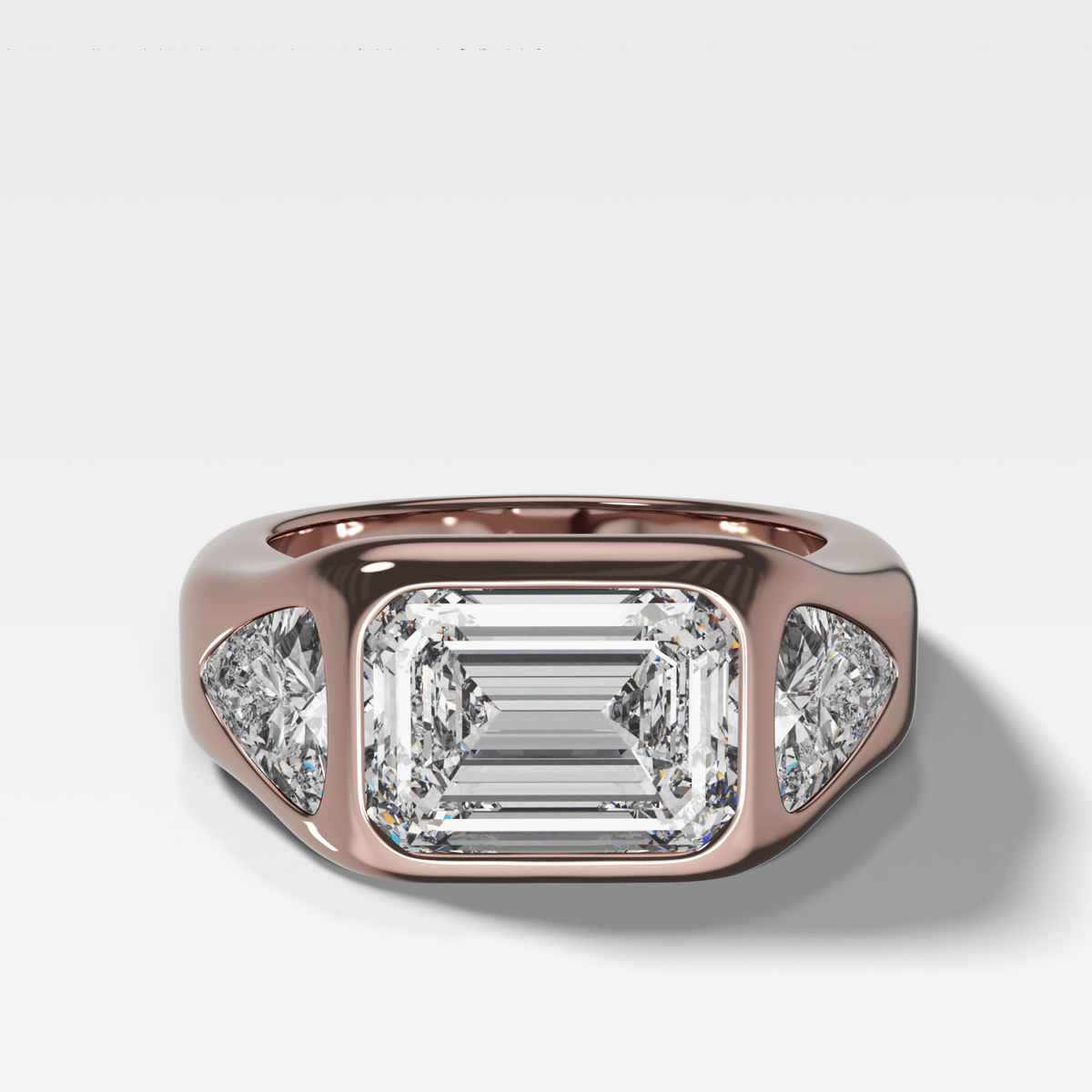 Burnished Three Stone Engagement Ring with Trilliant Sides and East West Emerald Cut Diamond - GOODSTONE