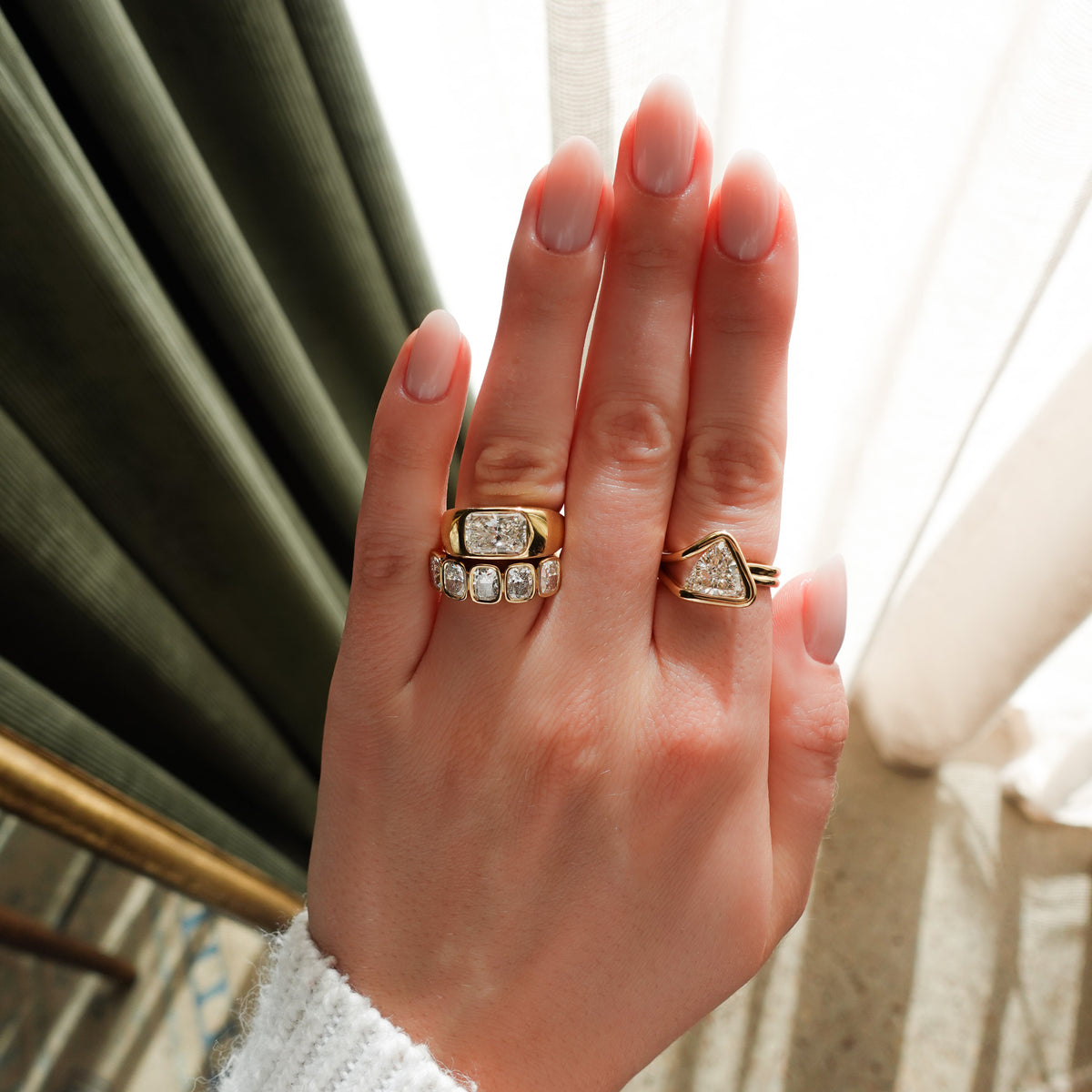 Burnished Solitaire Engagement Ring with Elongated Radiant Cut Diamond