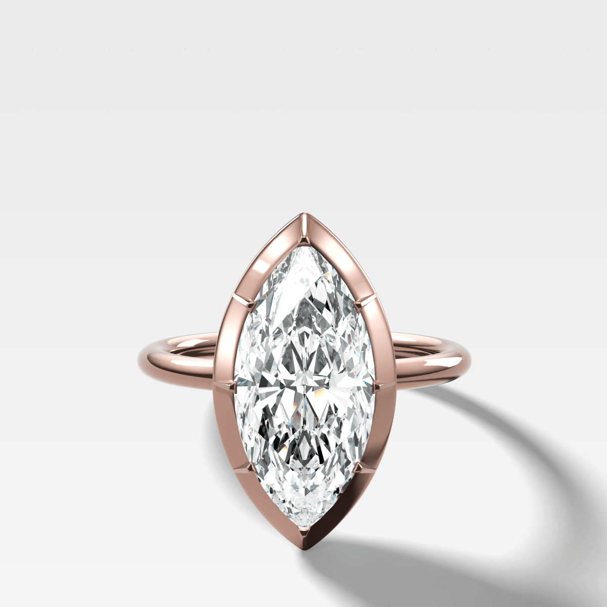 Button Back Solitaire Engagement Ring With a Marquise Cut Diamond - GOODSTONE