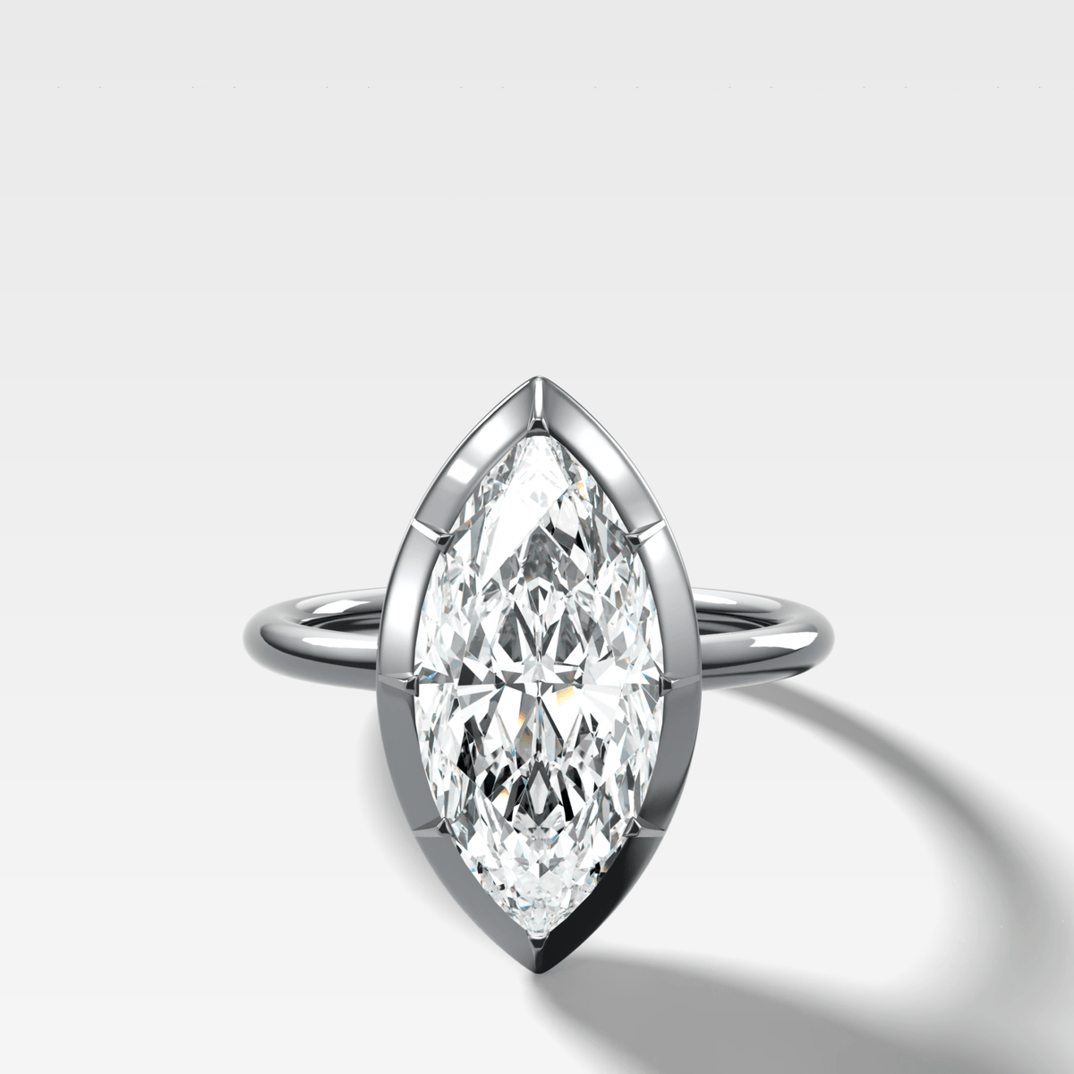 Button Back Solitaire Engagement Ring With a Marquise Cut Diamond - GOODSTONE