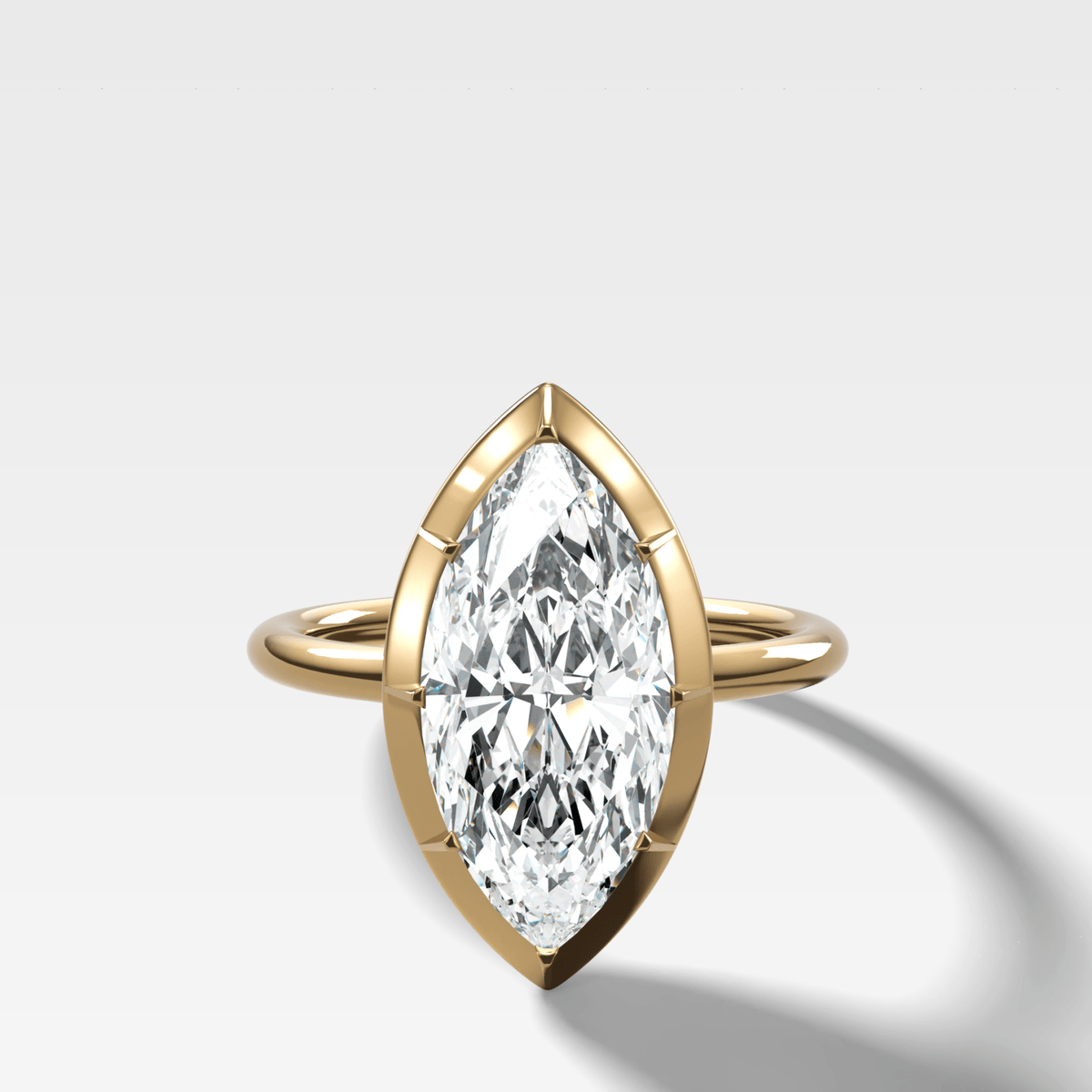 Button Back Solitaire Engagement Ring With a Marquise Cut Diamond - GOODSTONE