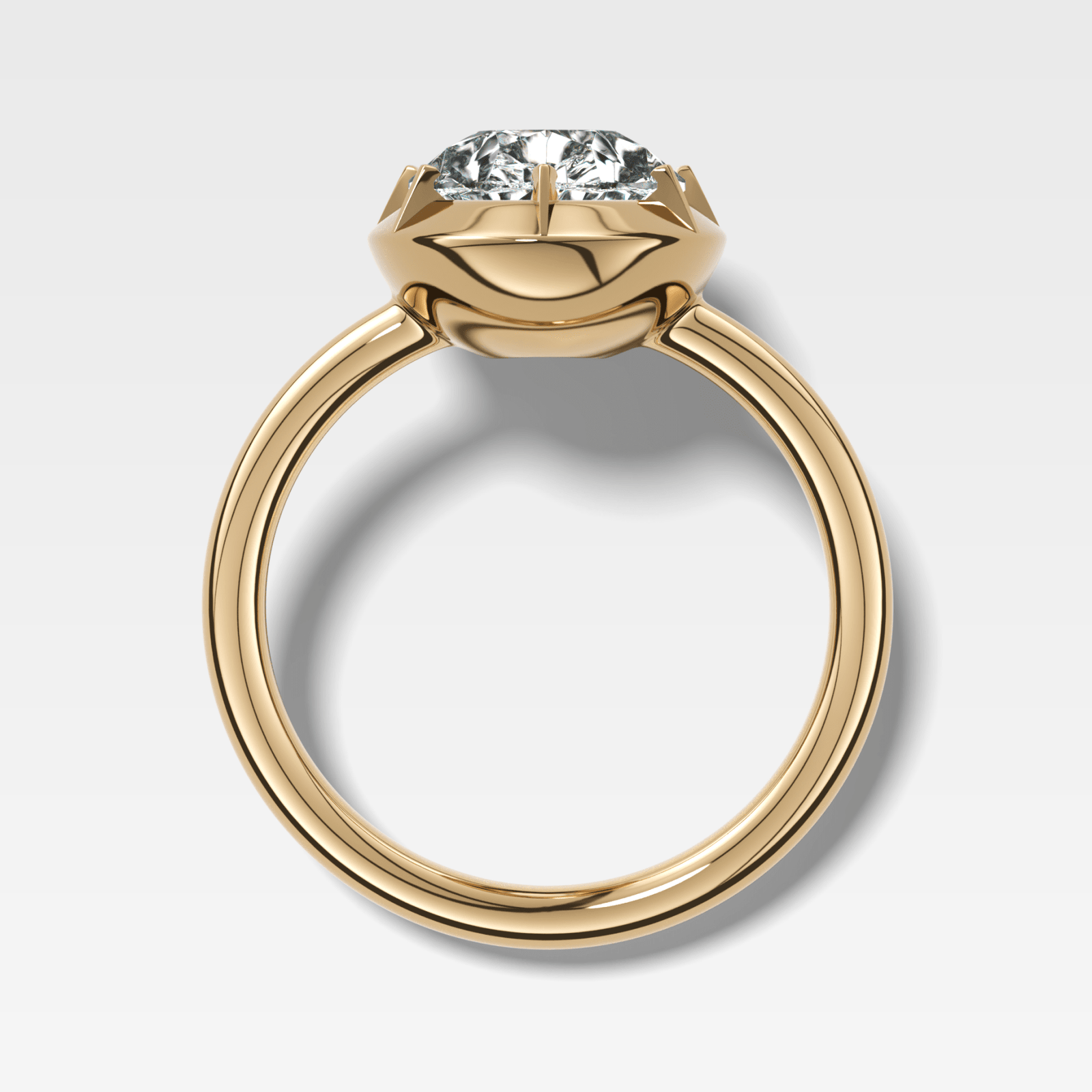 Button Back Solitaire Engagement Ring With a Pear Cut Diamond - GOODSTONE