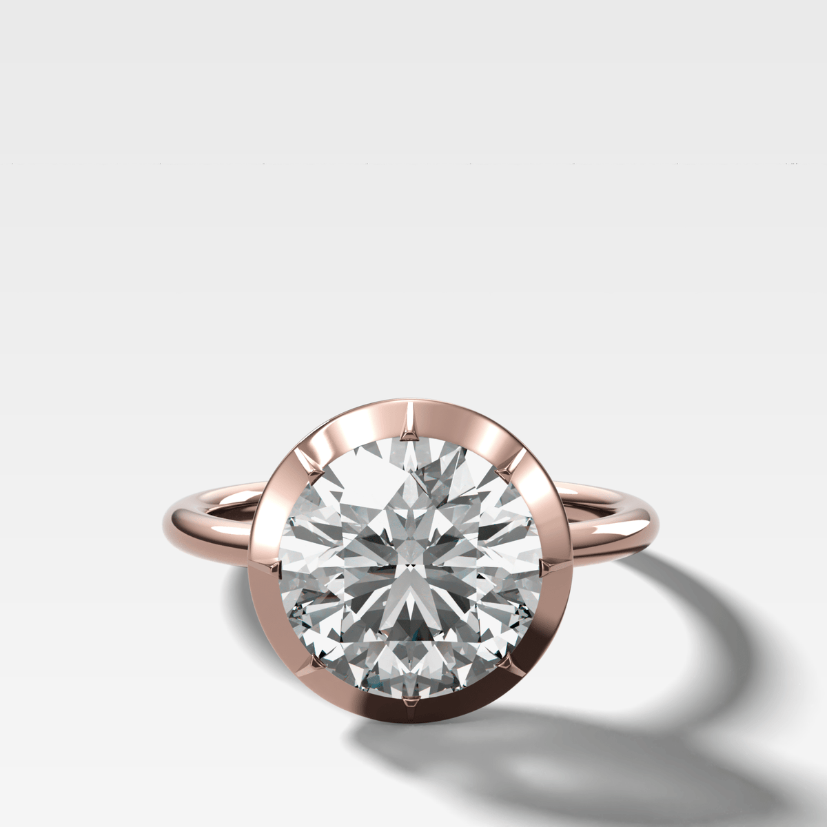 Button Back Solitaire Engagement Ring With a Round Cut Diamond - GOODSTONE