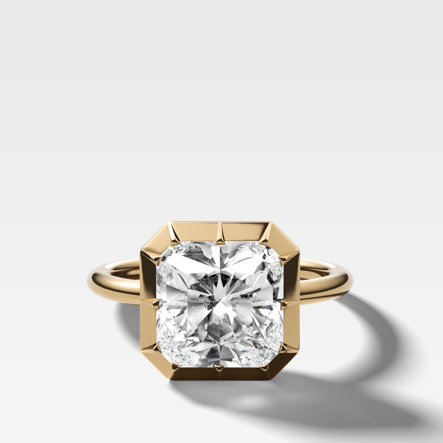 Button Back Solitaire Engagement Ring With a Square Radiant Cut Diamond - GOODSTONE