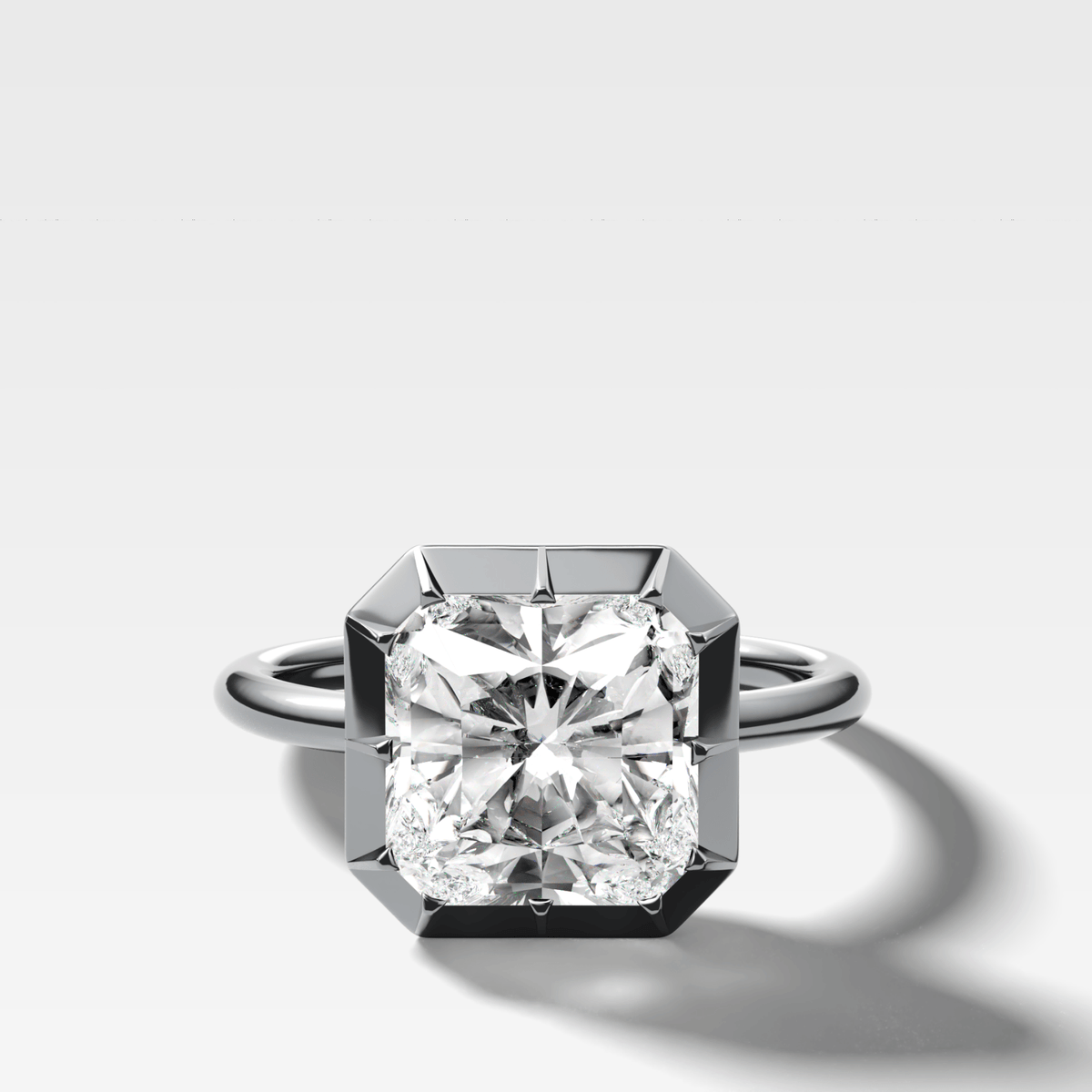 Button Back Solitaire Engagement Ring With a Square Radiant Cut Diamond - GOODSTONE