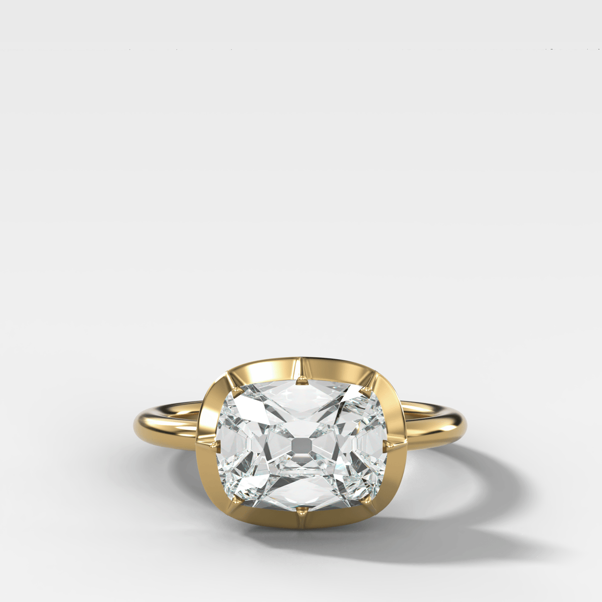 Button Back Solitaire Engagement Ring With an East West Old Mine Cut Diamond - GOODSTONE