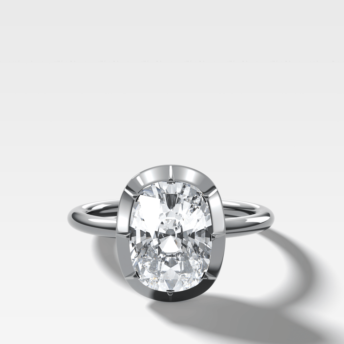 Button Back Solitaire Engagement Ring With an Elongated Cushion Cut Diamond - GOODSTONE