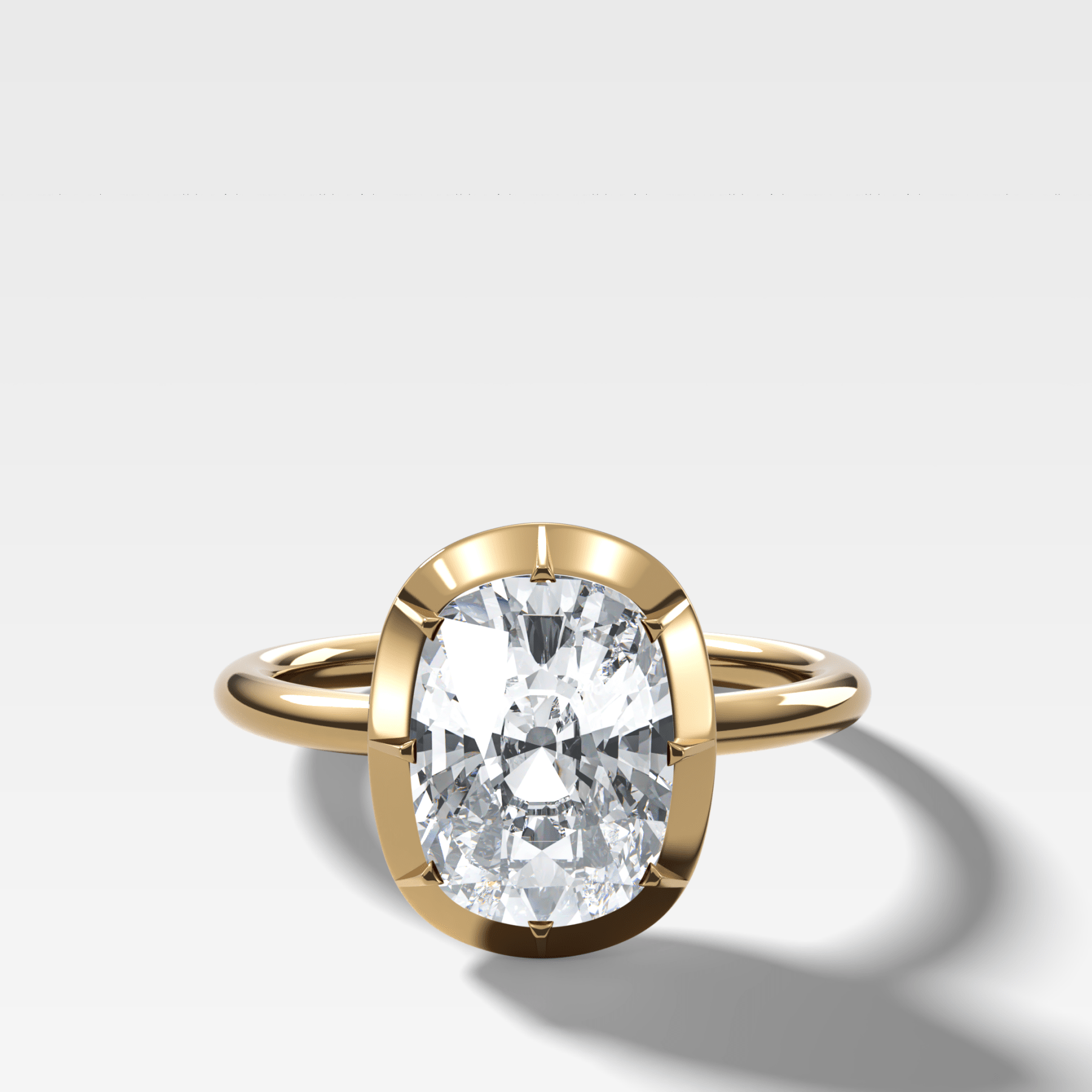 Button Back Solitaire Engagement Ring With an Elongated Cushion Cut Diamond - GOODSTONE