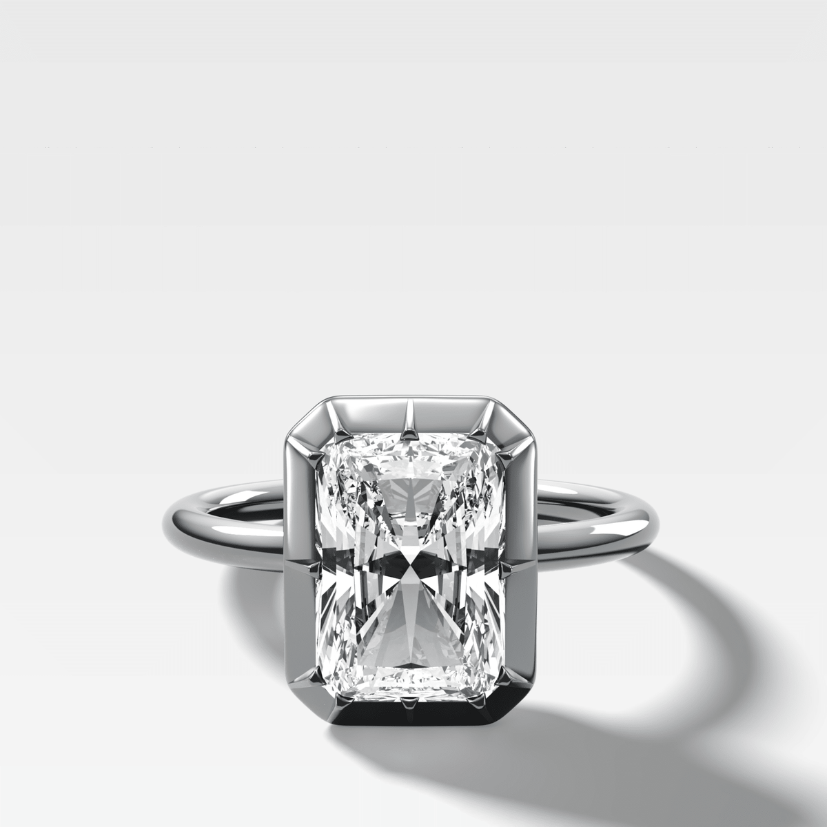 Button Back Solitaire Engagement Ring With an Elongated Radiant Cut Diamond - GOODSTONE