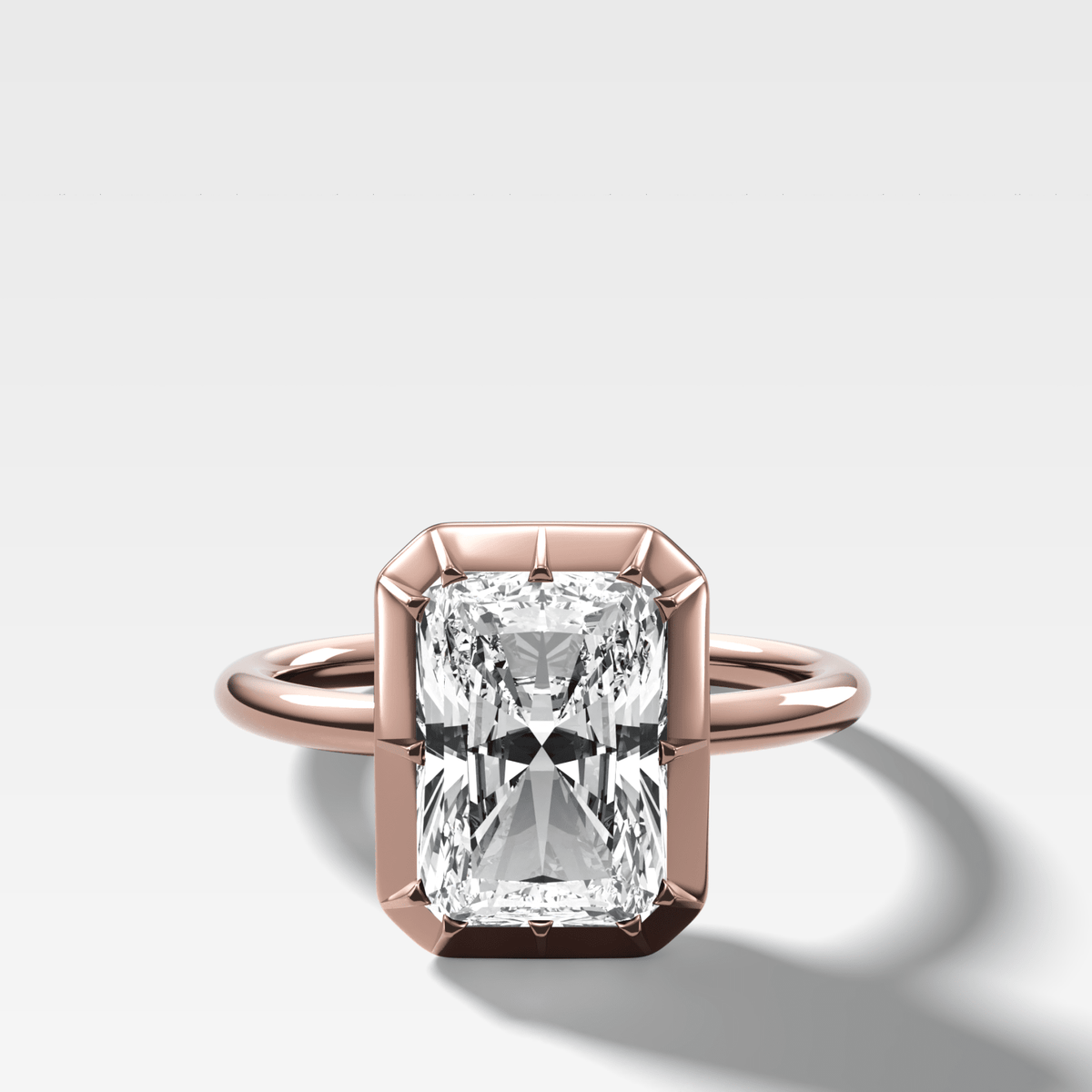 Button Back Solitaire Engagement Ring With an Elongated Radiant Cut Diamond - GOODSTONE