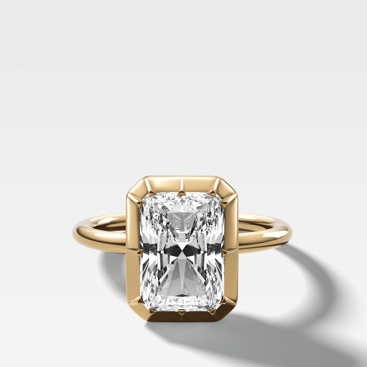 Button Back Solitaire Engagement Ring With an Elongated Radiant Cut Diamond - GOODSTONE