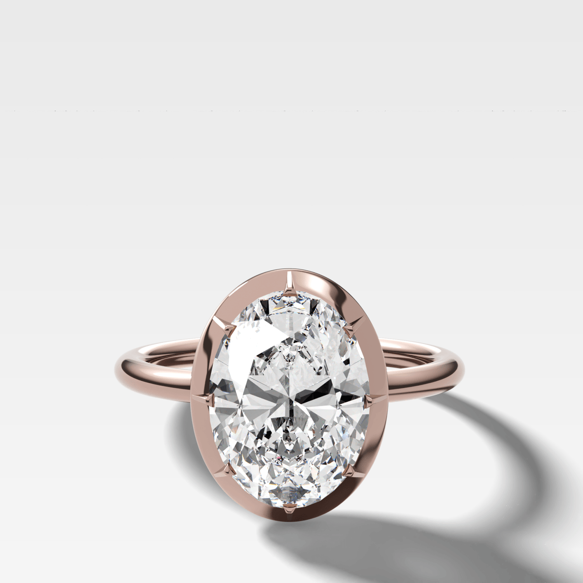 Button Back Solitaire Engagement Ring With an Oval Cut Diamond - GOODSTONE