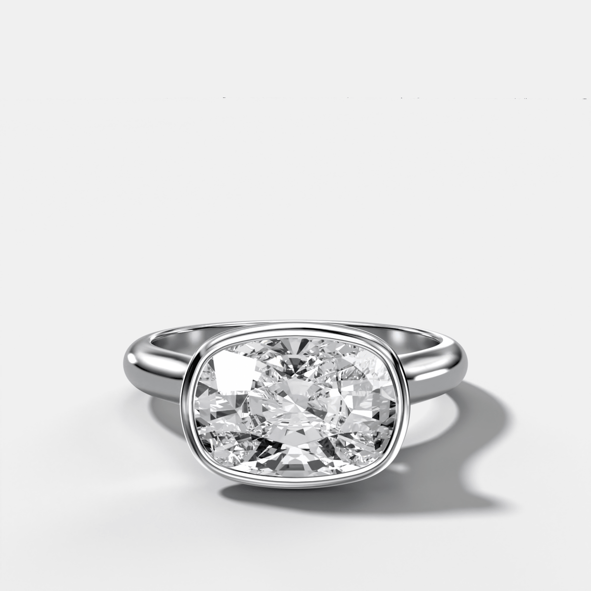 Cathedral Bezel Set Solitaire Engagement Ring With Elongated Cushion Diamond (East West) - GOODSTONE