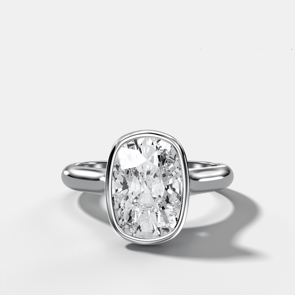 Cathedral Bezel Set Solitaire Engagement Ring With Elongated Cushion Diamond - GOODSTONE