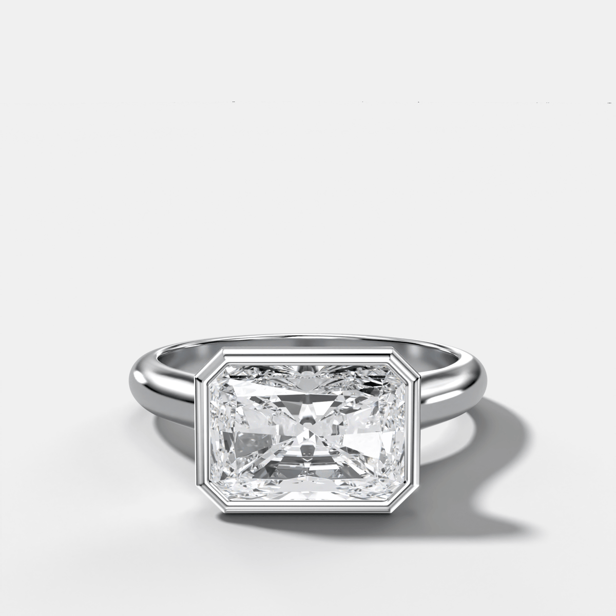 Cathedral Bezel Set Solitaire Engagement Ring With Elongated Radiant Diamond (East West) - GOODSTONE