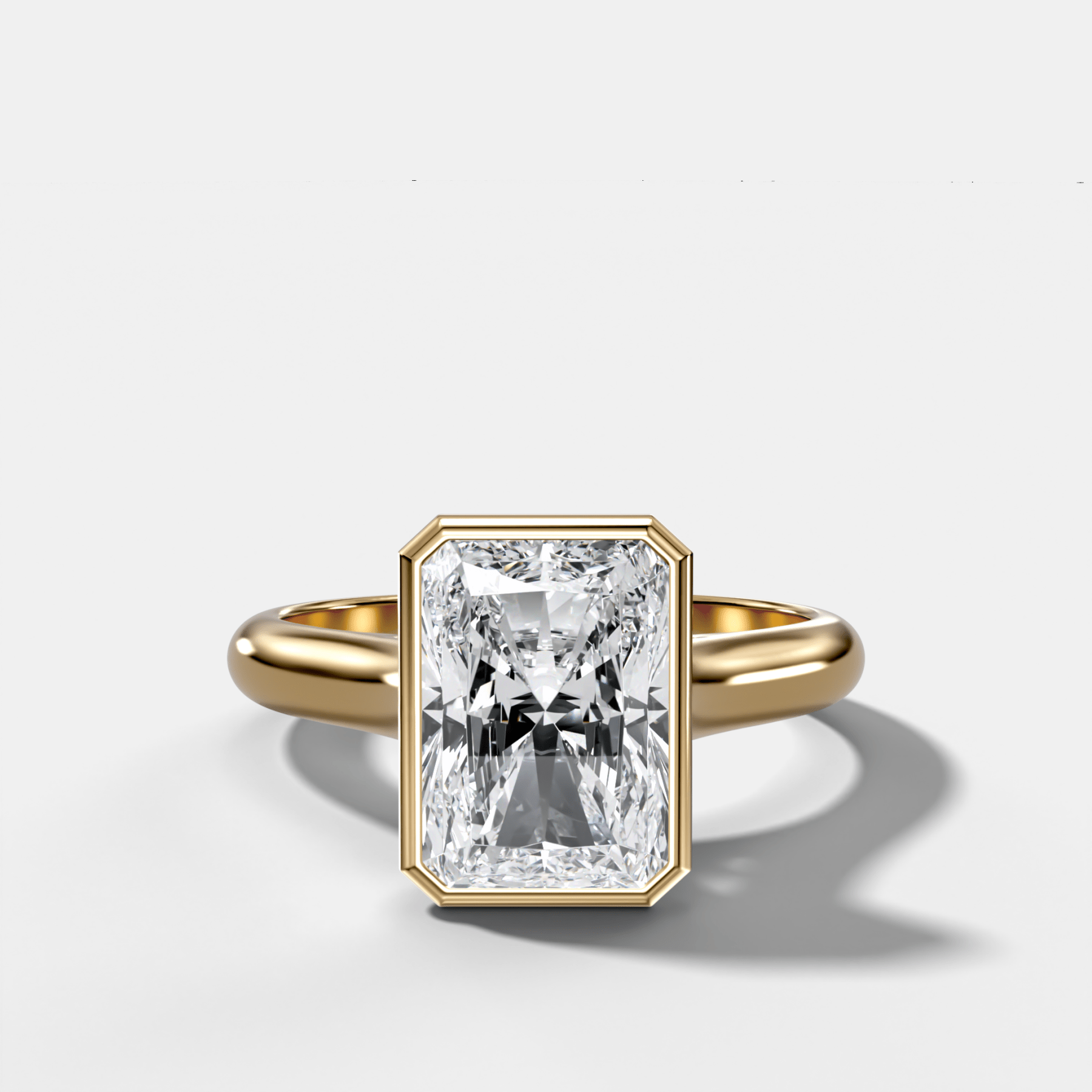 Cathedral Bezel Set Solitaire Engagement Ring With Elongated Radiant Diamond - GOODSTONE