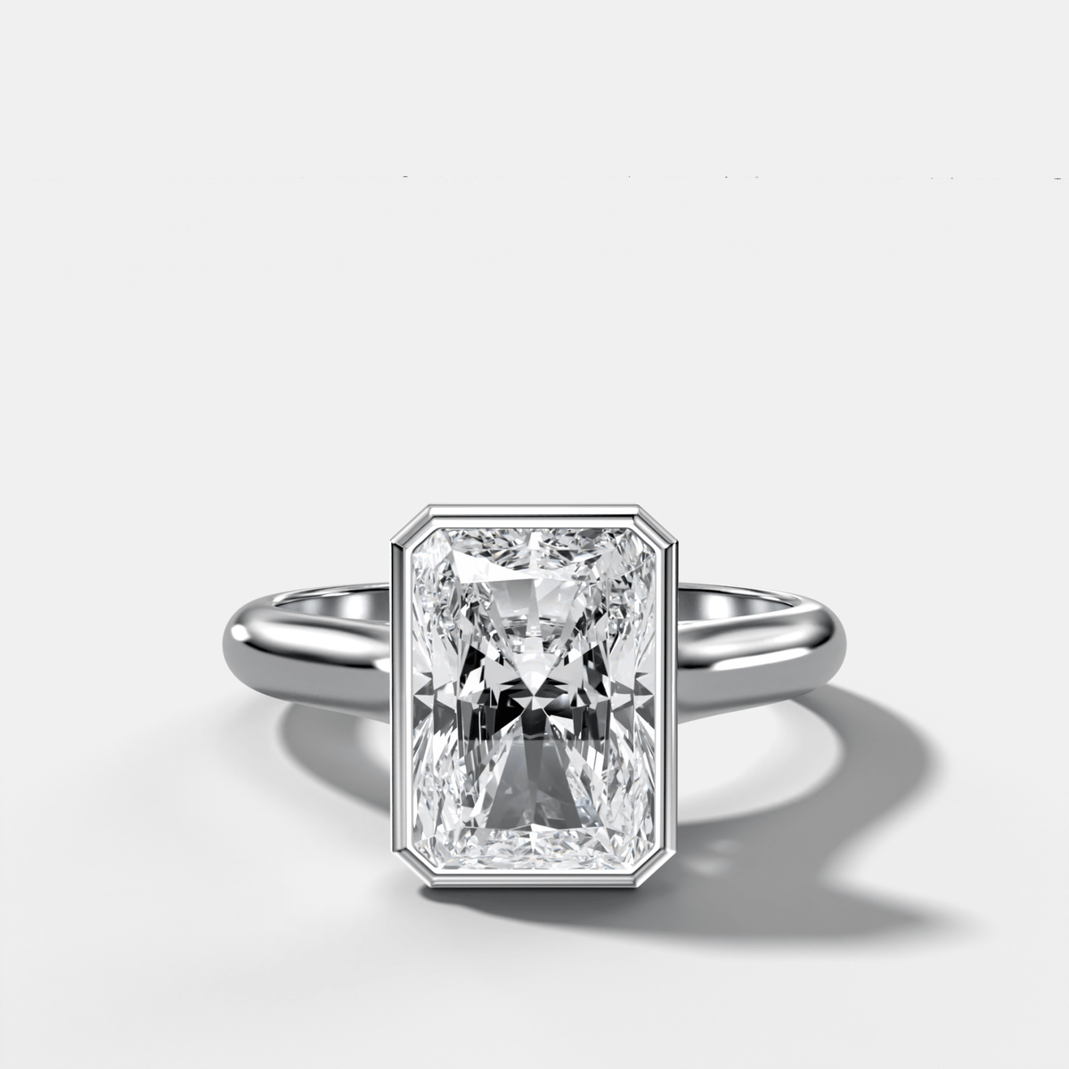 Cathedral Bezel Set Solitaire Engagement Ring With Elongated Radiant Diamond - GOODSTONE