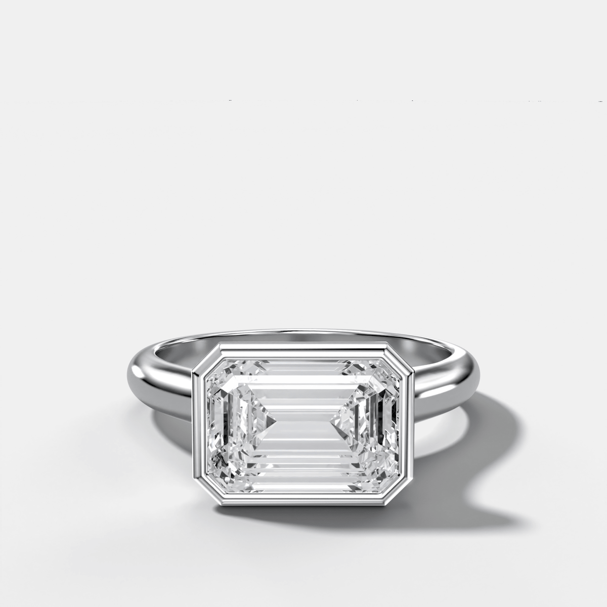 Cathedral Bezel Set Solitaire Engagement Ring With Emerald Cut Diamond (East West) - GOODSTONE