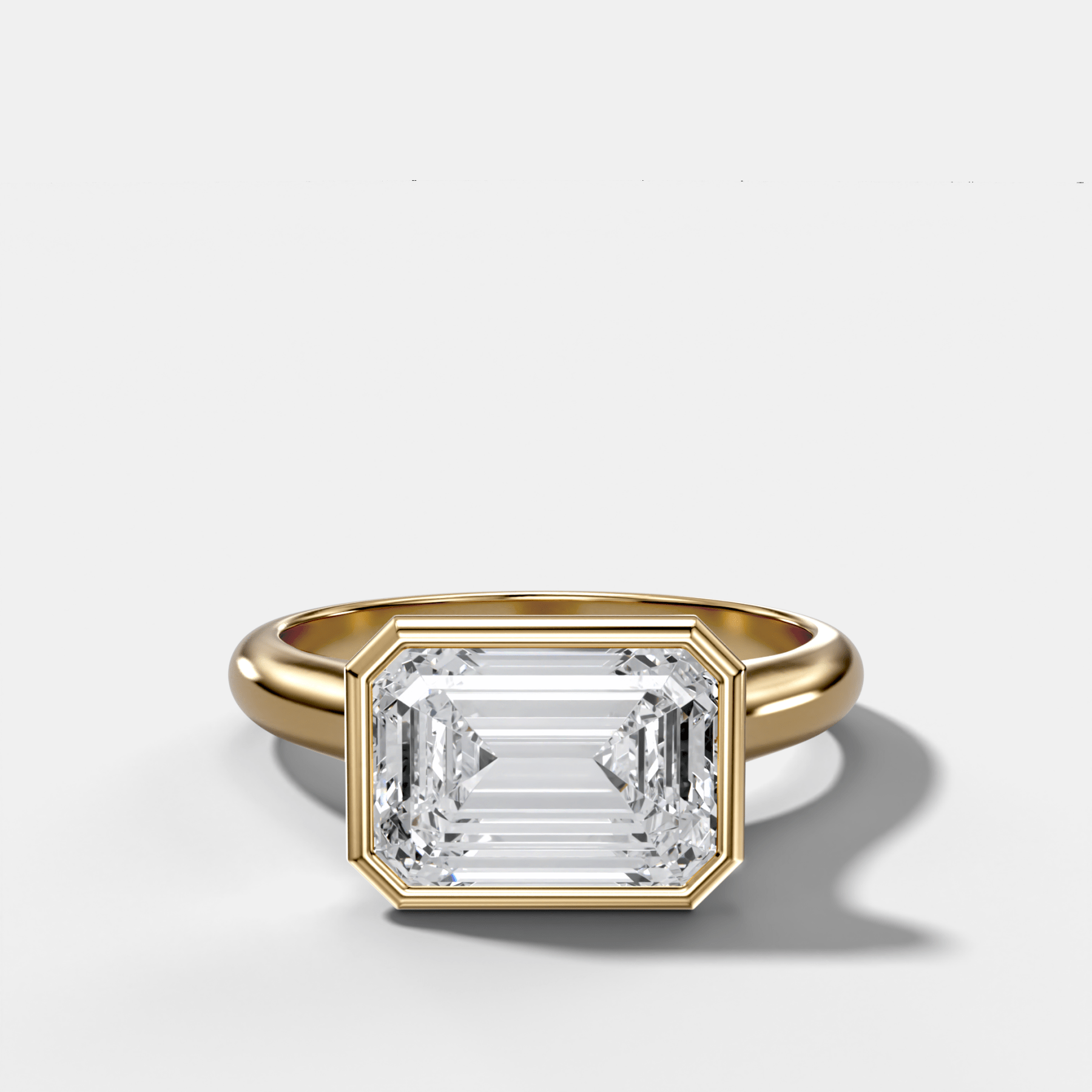 Cathedral Bezel Set Solitaire Engagement Ring With Emerald Cut Diamond (East West) - GOODSTONE