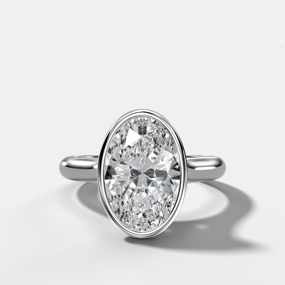 Cathedral Bezel Set Solitaire Engagement Ring With Oval Diamond - GOODSTONE