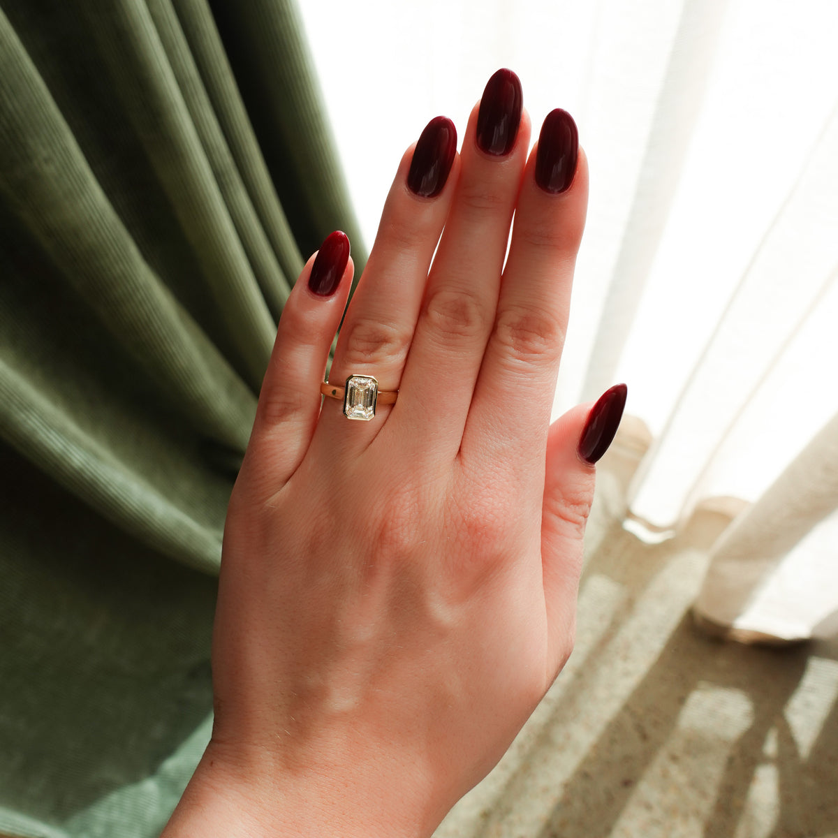 Cathedral Bezel Set Solitaire Engagement Ring With Emerald Diamond