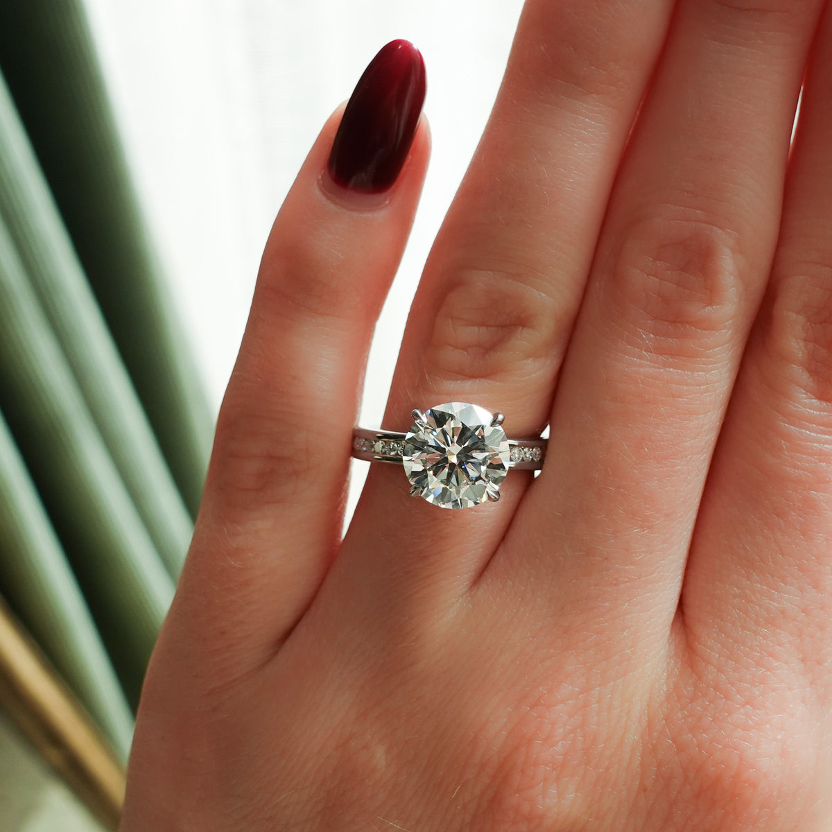 Petite Channel Set Engagement Ring with Round Cut Diamond