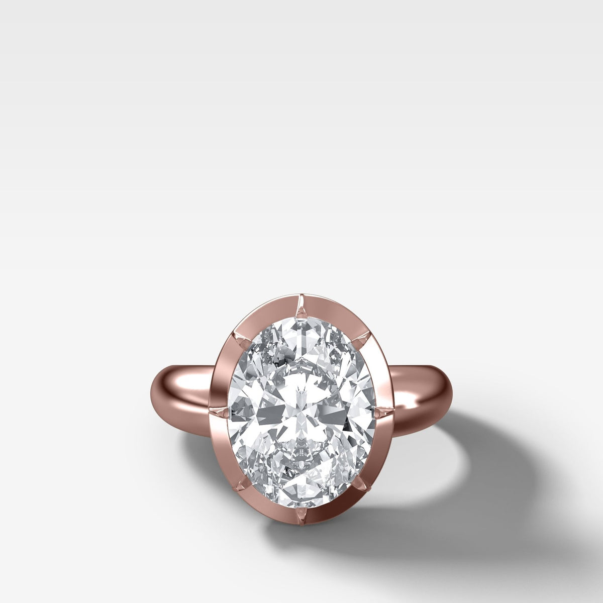 Club Button Back Solitaire with an Oval Cut Diamond - GOODSTONE