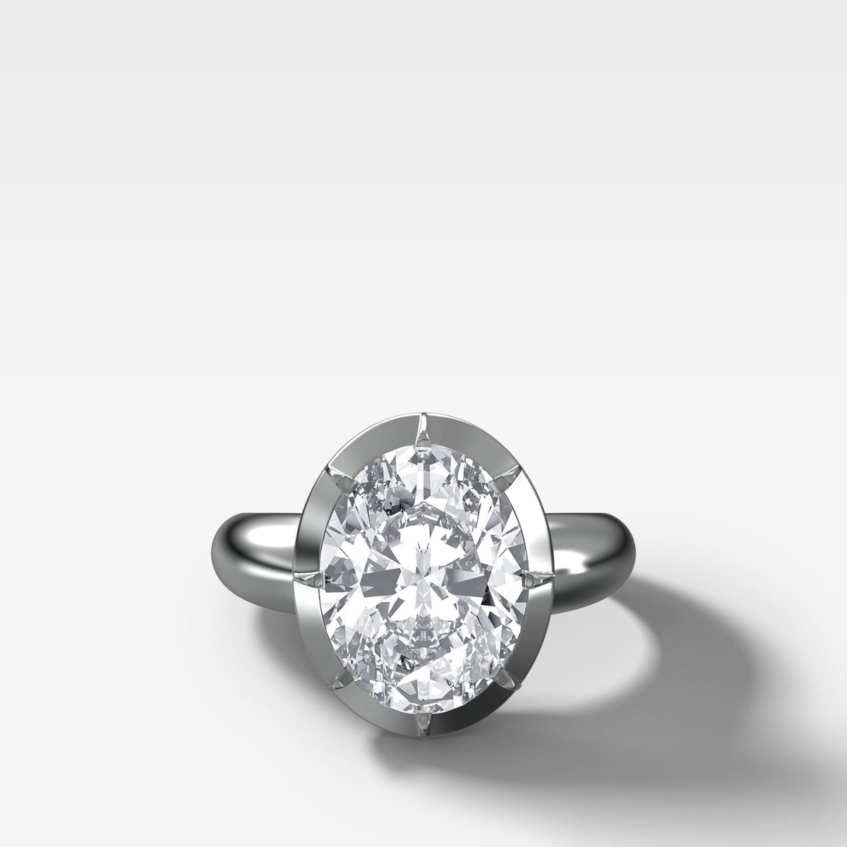 Club Button Back Solitaire with an Oval Cut Diamond - GOODSTONE